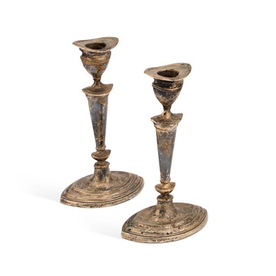 Lot 390 - A PAIR OF GEORGE V SILVER CANDLESTICKS