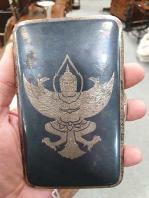 Lot 386 - A THAI STERLING SILVER NIELLO CIGARETTE CASE