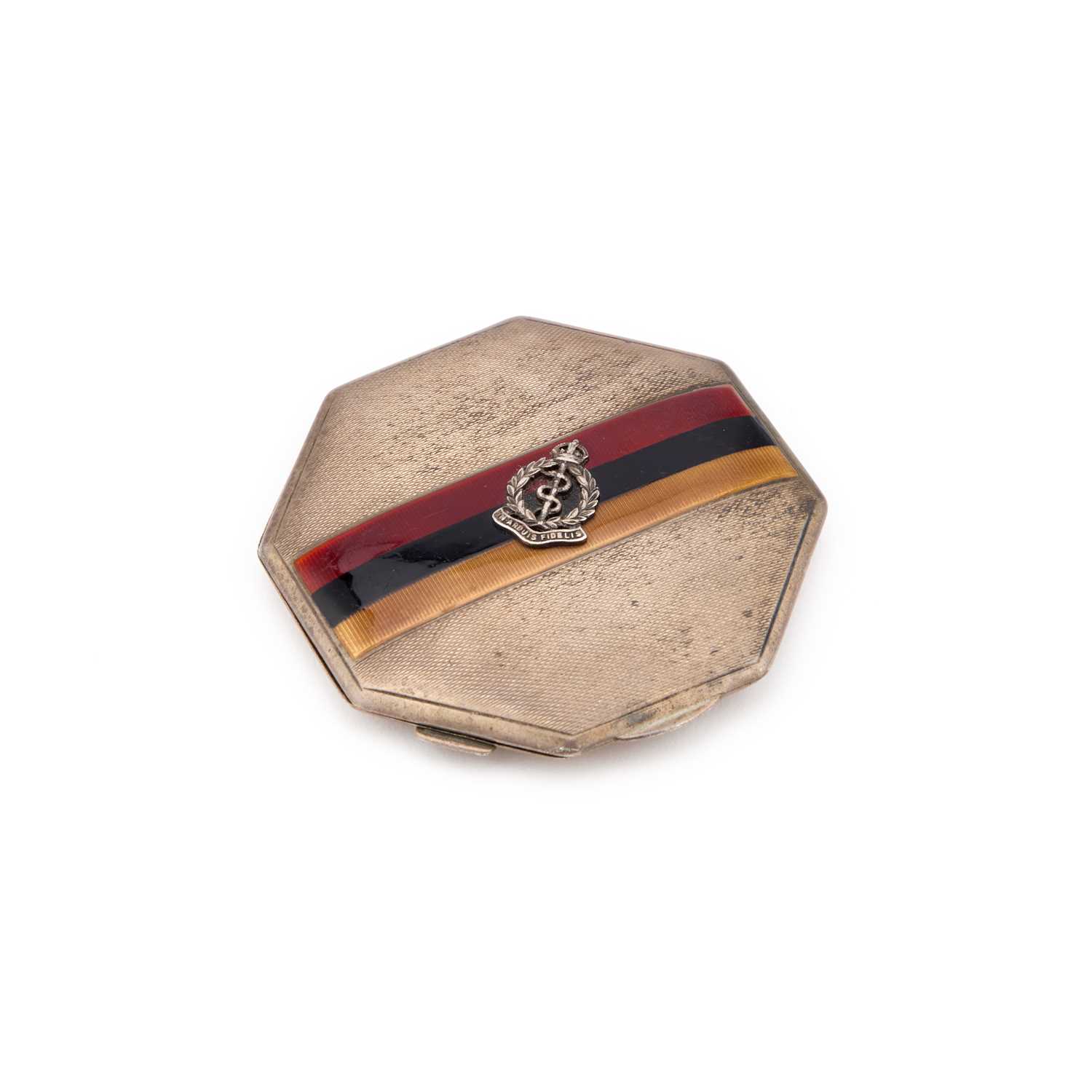 Lot 429 - REGIMENTAL INTEREST: A GEORGE V SILVER AND ENAMEL COMPACT