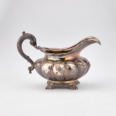 Lot 488 - A WILLIAM IV SILVER CREAM JUG