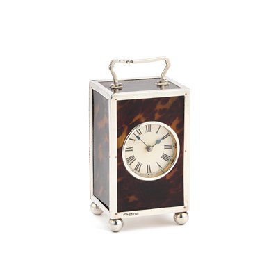 Lot 448 - A GEORGE V SILVER-MOUNTED TORTOISESHELL CARRIAGE CLOCK