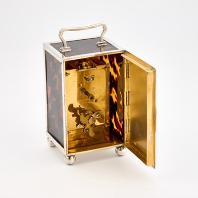 Lot 448 - A GEORGE V SILVER-MOUNTED TORTOISESHELL CARRIAGE CLOCK
