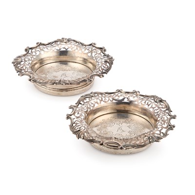 Lot 481 - A PAIR OF EARLY VICTORIAN SILVER COASTERS