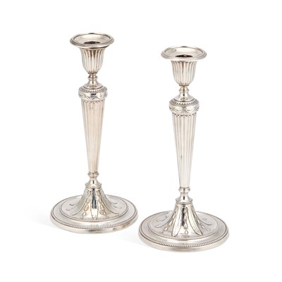 Lot 533 - A PAIR OF EARLY GEORGE III CAST SILVER CANDLESTICKS