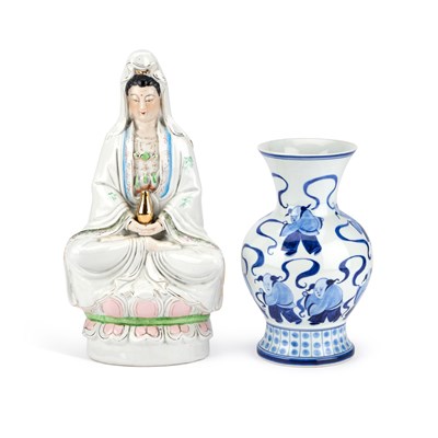 Lot 129 - A CHINESE PORCELAIN MODEL OF A GODDESS AND A CHINESE BLUE AND WHITE VASE