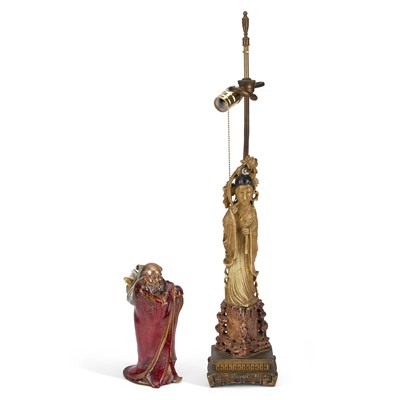 Lot 150 - A CHINESE SOAPSTONE FIGURAL TABLE LAMP TOGETHER WITH A RED GLAZED FIGURE