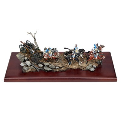 Lot 26 - A LARGE MILITARY MODEL OF MOUNTED SOLDIERS PULLING A CANNON