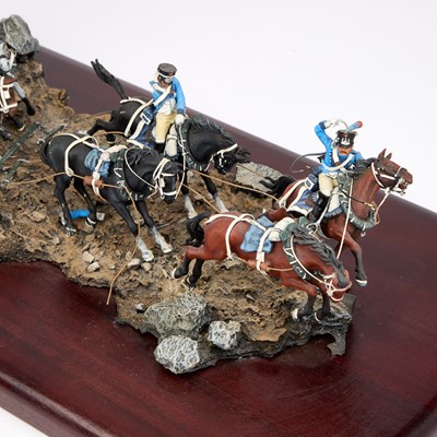 Lot 26 - A LARGE MILITARY MODEL OF MOUNTED SOLDIERS PULLING A CANNON