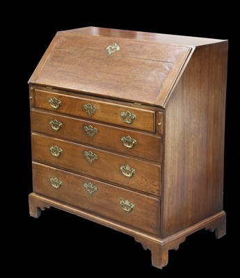 Lot 343 - A GEORGE III OAK SLANT-FRONT BUREAU