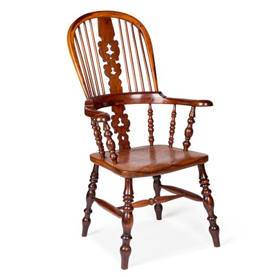 Lot 1110 - A 19TH CENTURY YEW WOOD BROAD-ARM WINDSOR ARMCHAIR