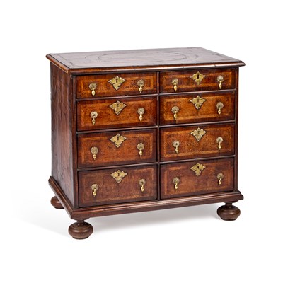 Lot 1060 - A RARE WILLIAM AND MARY BURR ELM STRAIGHT-FRONTED CHEST OF EIGHT SHORT DRAWERS