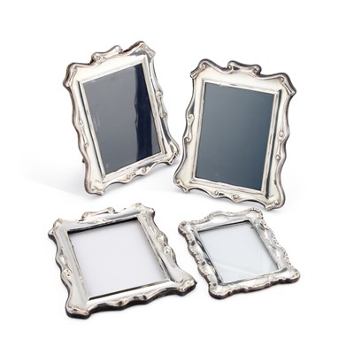 Lot 310 - A PAIR OF ELIZABETH II SILVER-MOUNTED PHOTOGRAPH FRAMES