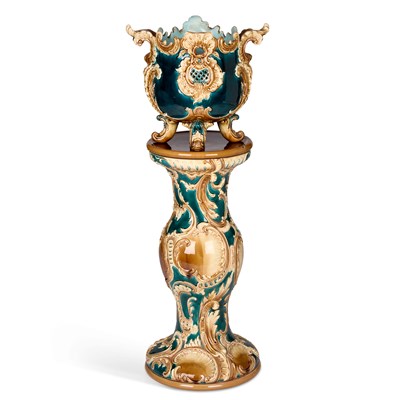 Lot 97 - A 19TH CENTURY CONTINENTAL MAJOLICA JARDINIÈRE ON STAND