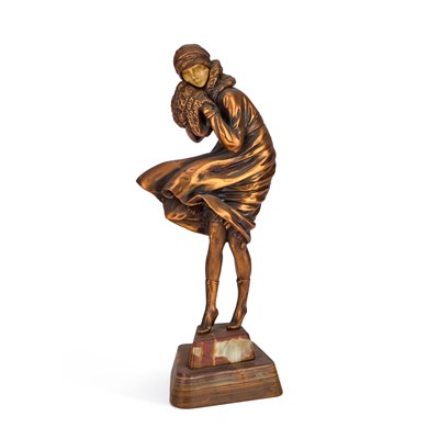 Lot 918 - AN ART DECO STYLE PATINATED METAL AND FAUX IVORY FIGURE