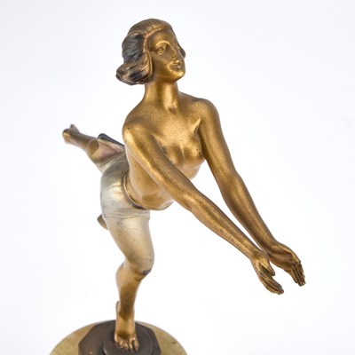 Lot 924 - AN ART DECO STYLE PATINATED METAL FIGURE