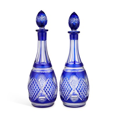 Lot 81 - A PAIR OF BOHEMIAN BLUE FLASH GLASS DECANTERS AND STOPPERS