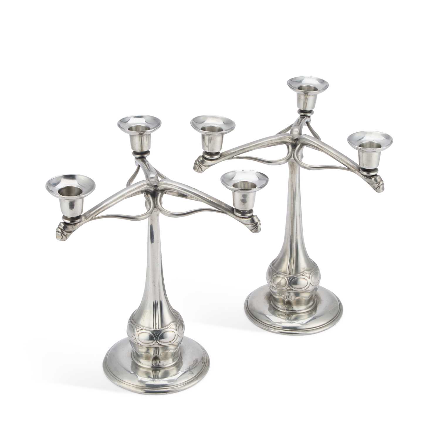 Lot 276 - A RARE PAIR OF LIBERTY & CO TUDRIC PEWTER THREE-LIGHT CANDELABRA