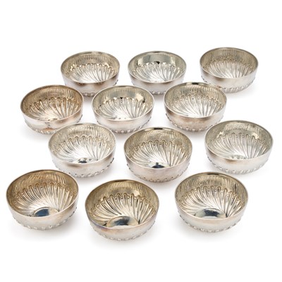 Lot 469 - A SET OF TWELVE VICTORIAN SILVER FINGER BOWLS