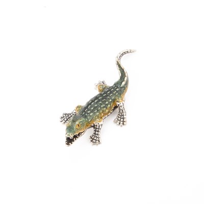 Lot 364 - AN ELIZABETH II SILVER AND ENAMEL MODEL OF A CROCODILE