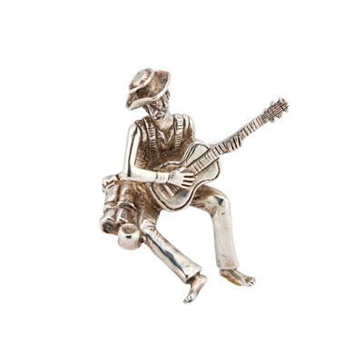 Lot 344 - AN ELIZABETH II CAST SILVER FIGURE OF A GUITAR PLAYER