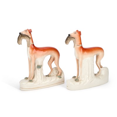 Lot 114 - A PAIR OF VICTORIAN STAFFORDSHIRE POTTERY GREYHOUND COURSING FIGURES