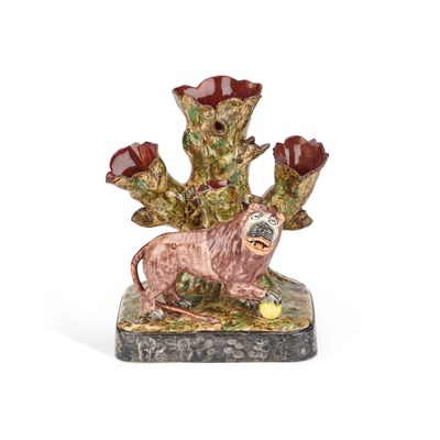 Lot 106 - A STAFFORDSHIRE POTTERY 'LION' SPILL VASE