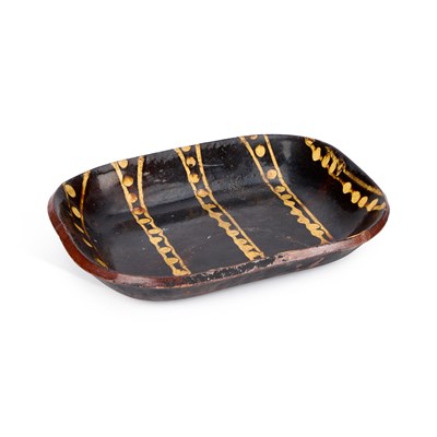 Lot 101 - A BUCKLEY POTTERY SLIPWARE BAKING DISH