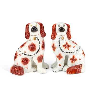 Lot 103 - A PAIR OF VICTORIAN STAFFORDSHIRE POTTERY MODELS OF SPANIELS