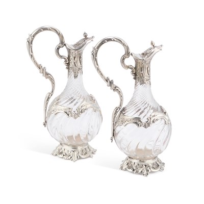 Lot 289 - A PAIR OF ROCOCO REVIVAL FRENCH SILVER-MOUNTED GLASS CLARET JUGS