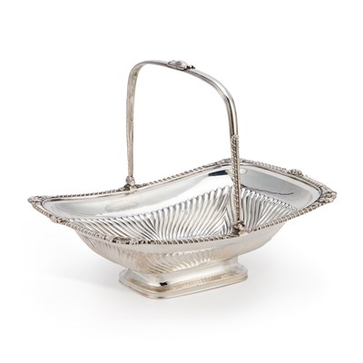 Lot 520 - A GEORGE III SILVER CAKE BASKET