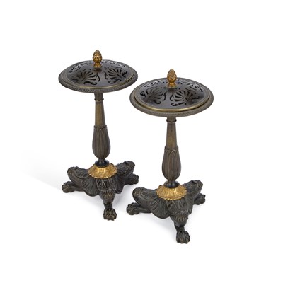 Lot 934 - A PAIR OF 19TH CENTURY FRENCH PATINATED AND PARCEL-GILT BRONZE POTPOURRI STANDS AND COVERS