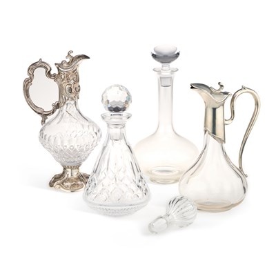 Lot 307 - A SILVER-MOUNTED GLASS CLARET JUG