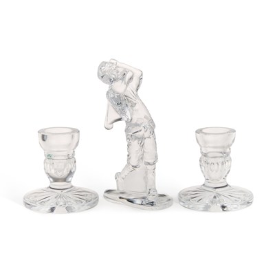 Lot 42 - A WATERFORD GLASS FIGURE OF A GOLFER AND A PAIR OF WATERFORD GLASS CANDLESTICKS