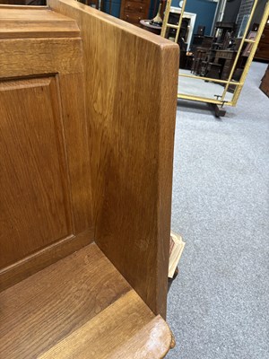 Lot 1157 - ROBERT THOMPSON OF KILBURN, A MOUSEMAN OAK WING-BACK HALL SEAT