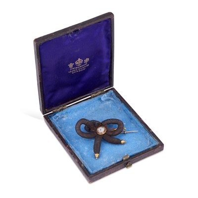 Lot 337 - A GEORGIAN LOVER'S EYE PORTRAIT MINIATURE HAIRWORK BROOCH