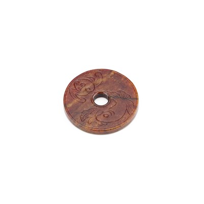 Lot 238 - A CHINESE JADE BI DISC