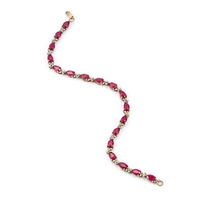 Lot A 9 CARAT GOLD RUBY AND DIAMOND LINE BRACELET