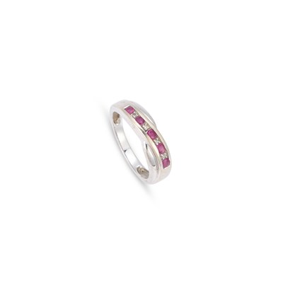 Lot A 9 CARAT WHITE GOLD HALF HOOP RUBY AND DIAMOND RING