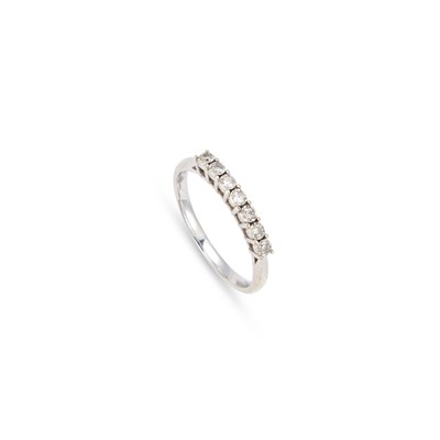 Lot A 9 CARAT WHITE GOLD HALF HOOP DIAMOND RING