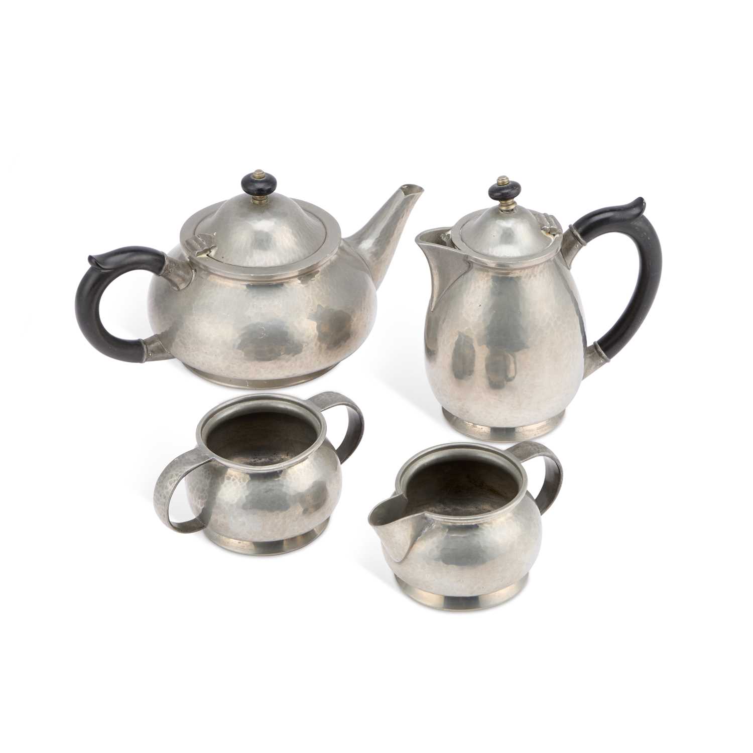 Lot 279 - ARCHIBALD KNOX (1864-1933) FOR LIBERTY & CO, A TUDRIC PEWTER FOUR PIECE TEA SERVICE