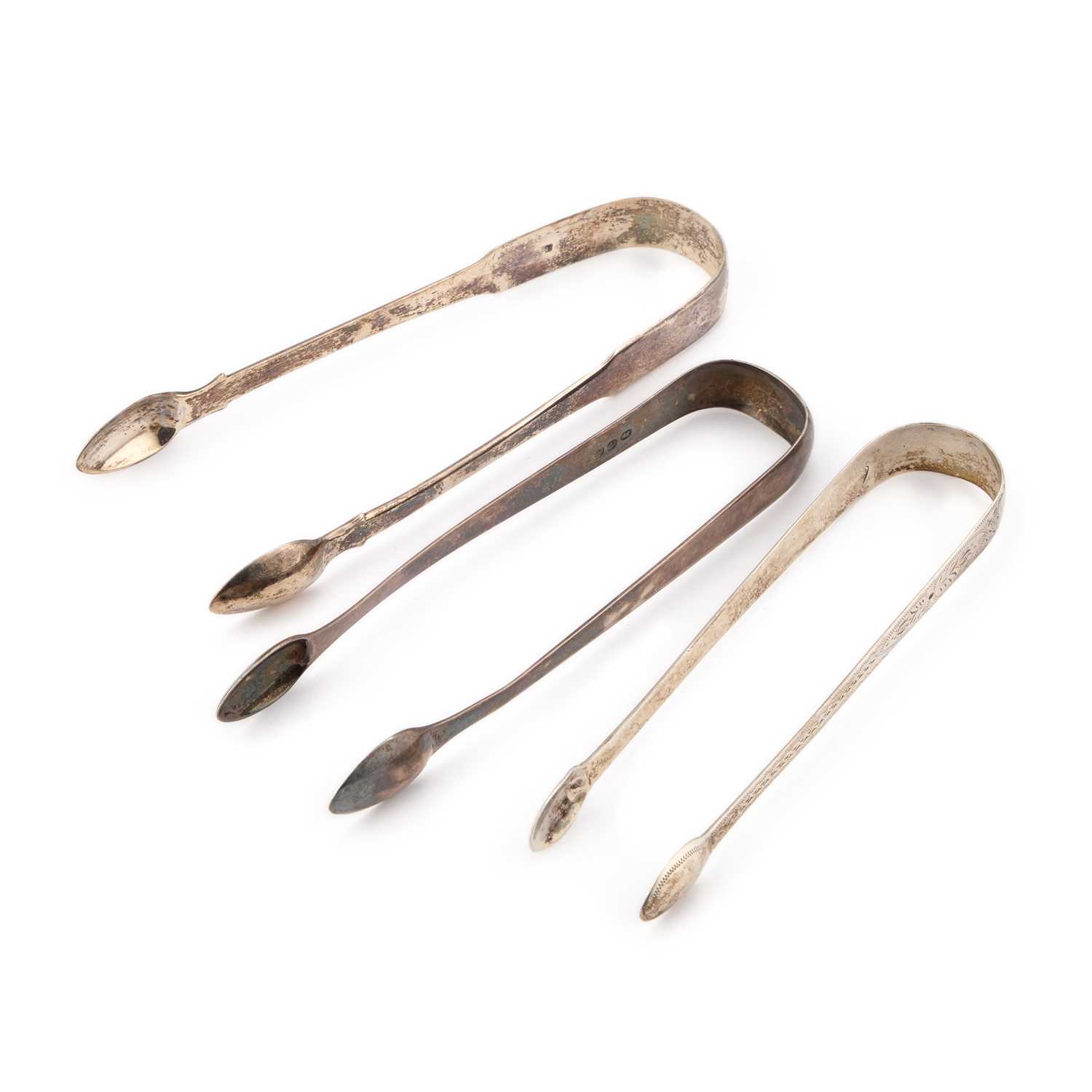 Lot 576 - THREE PAIRS OF GEORGIAN SILVER SUGAR TONGS