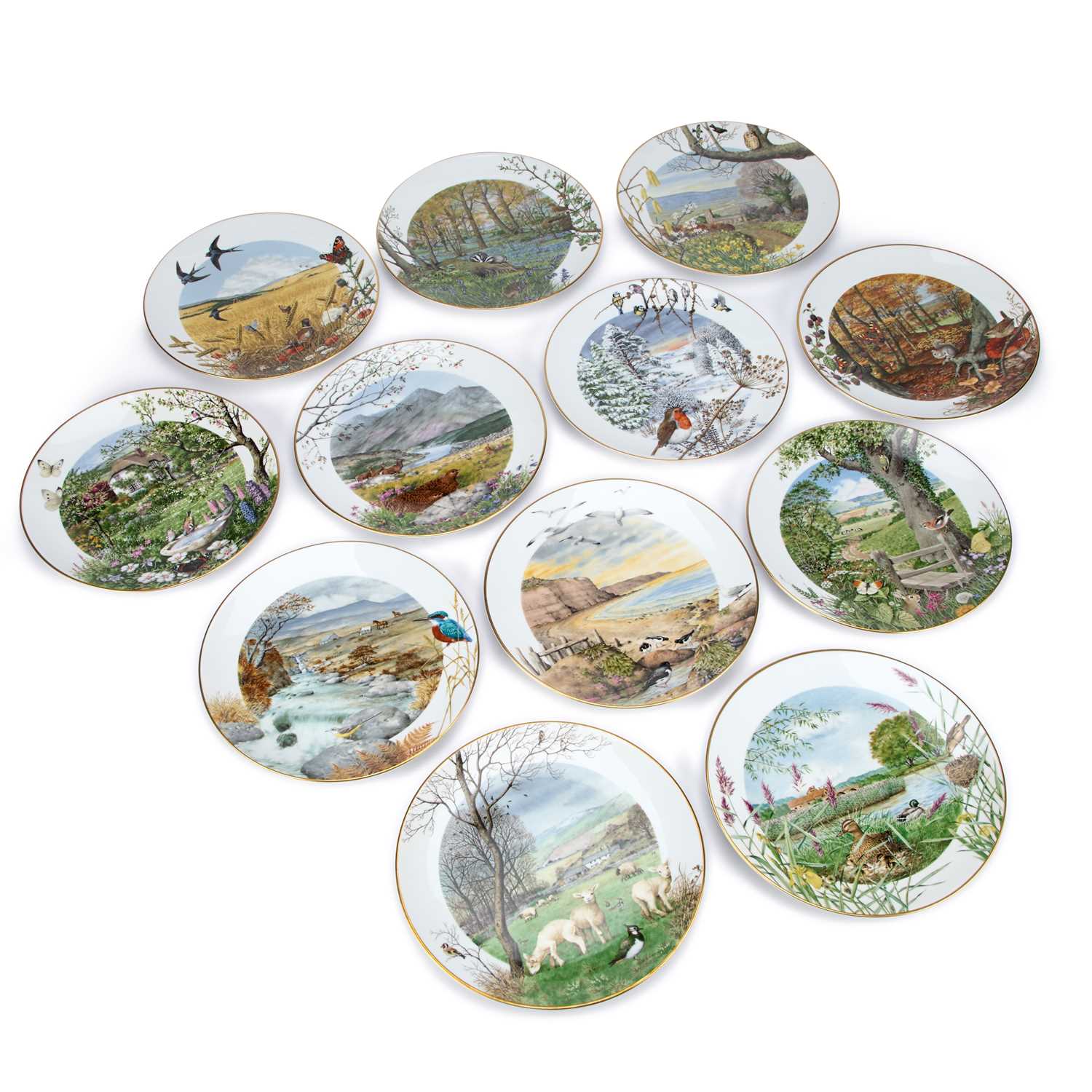 Lot 149 - A SET OF TWELVE ROYAL WORCESTER 'SCENES OF THE ENGLISH COUNTRYSIDE' PLATES