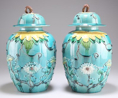 Lot 140 - A PAIR OF CHINESE FAHUA VASES AND COVERS, 19TH CENTURY