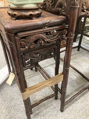 Lot 452 - A SET OF FOUR CHINESE HARDWOOD NESTING TABLES