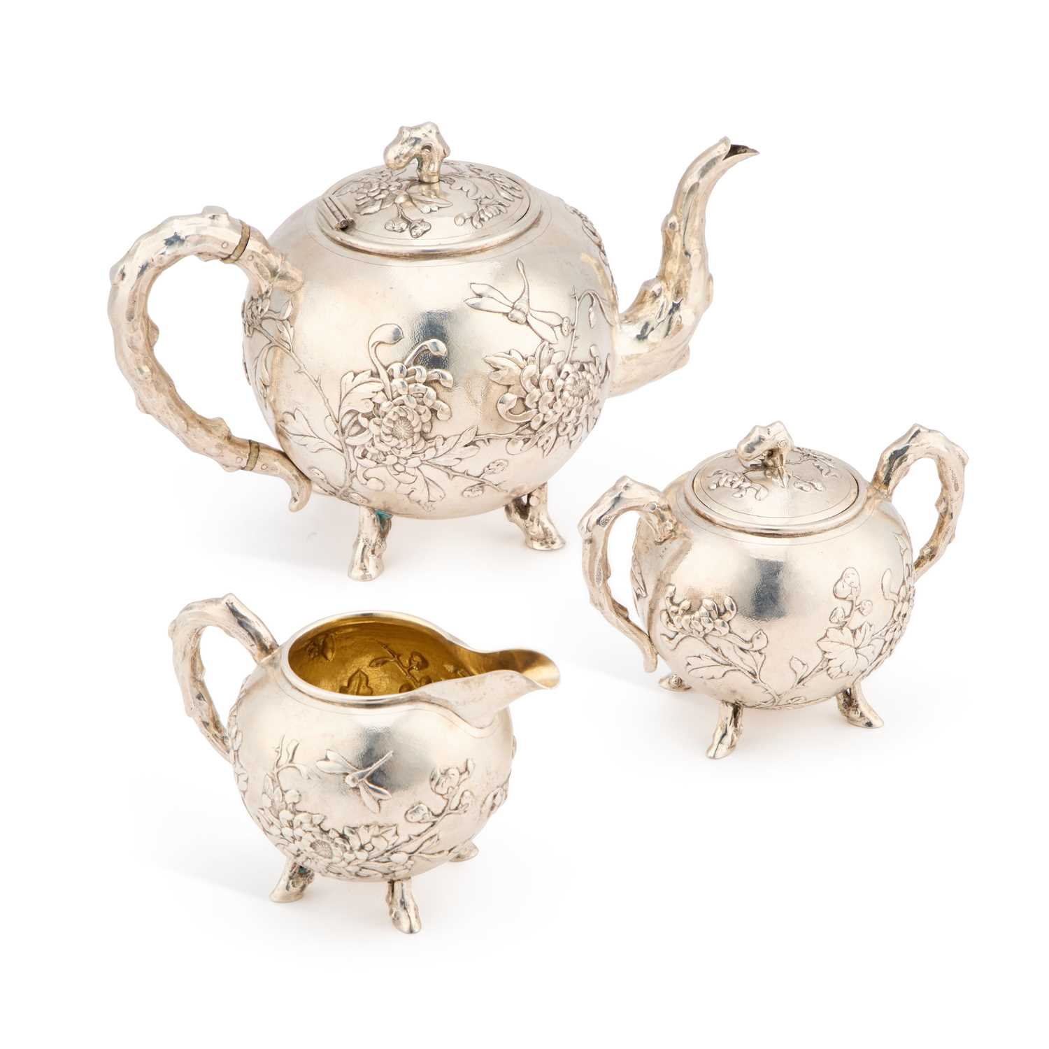 Lot A CHINESE SILVER THREE-PIECE TEA SERVICE