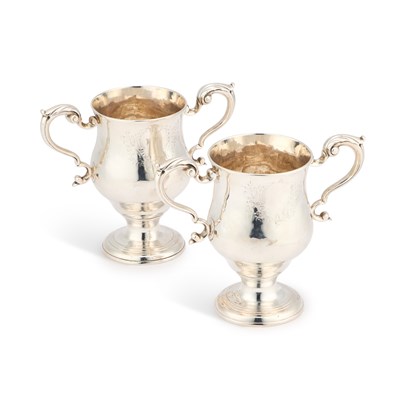 Lot A PAIR OF GEORGE III IRISH SILVER TWO-HANDLED CUPS