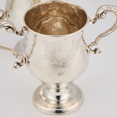 Lot A PAIR OF GEORGE III IRISH SILVER TWO-HANDLED CUPS