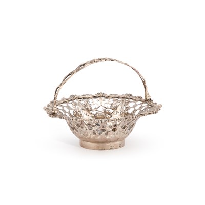 Lot A GEORGE III SILVER SWING-HANDLE SWEETMEAT BASKET