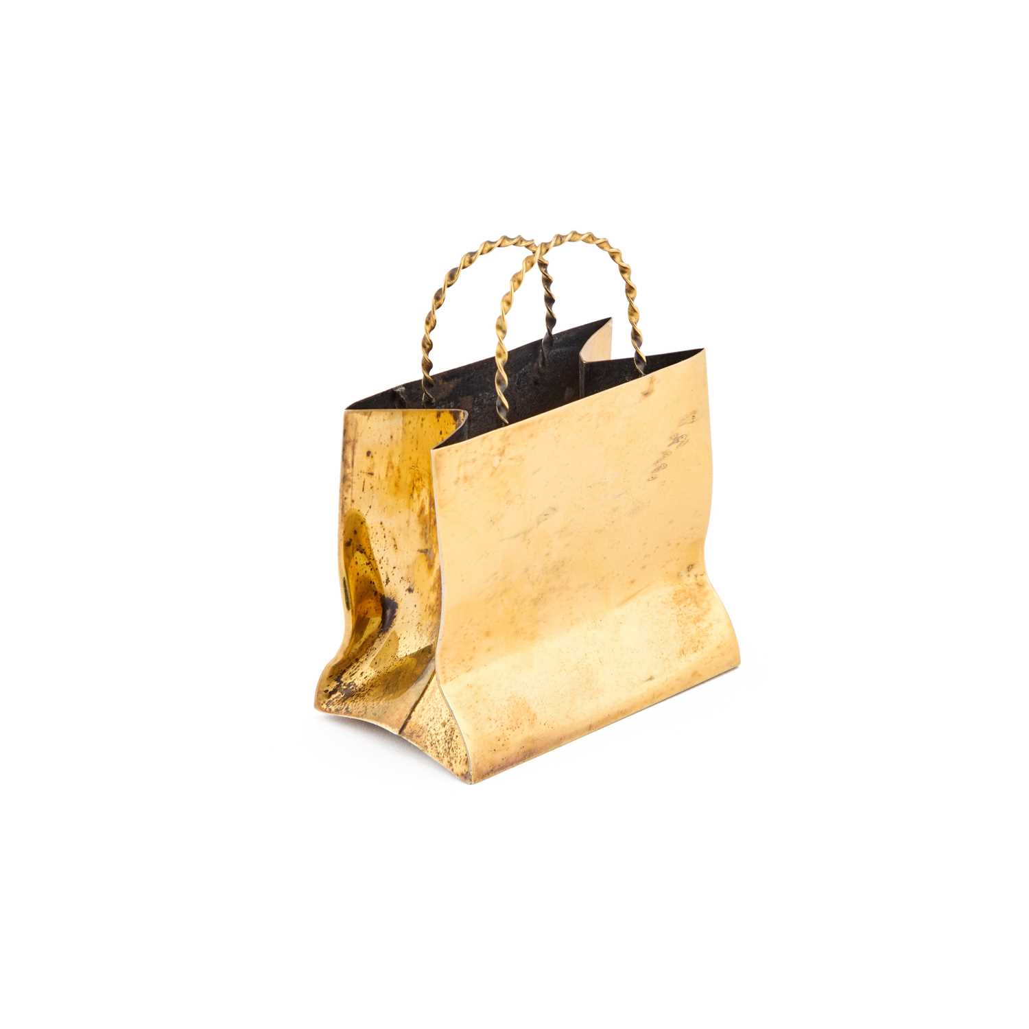Lot 103 - CARTIER: A STERLING SILVER-GILT MINIATURE BAG