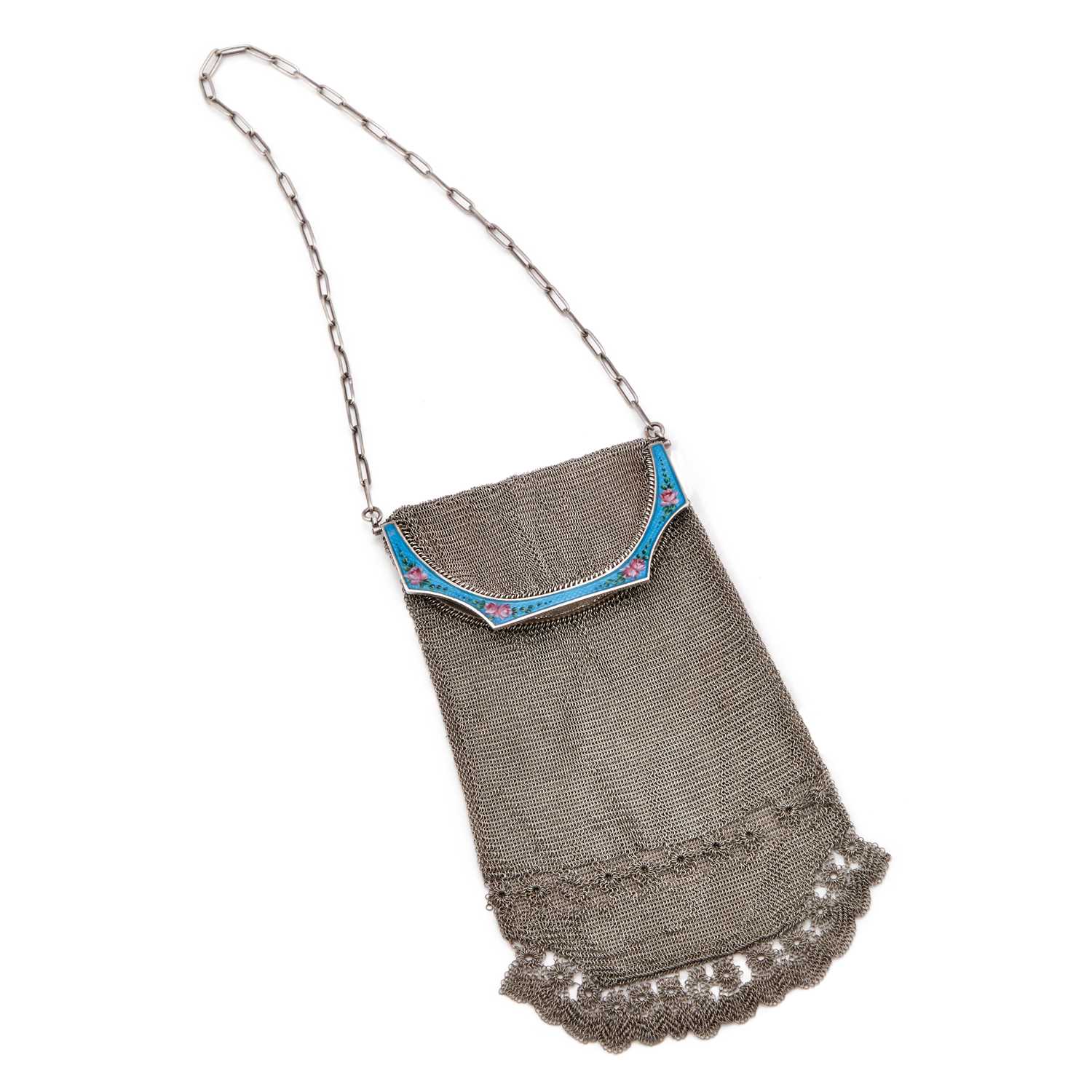 Lot 668 - A GEORGE V SILVER AND ENAMEL MESH PURSE